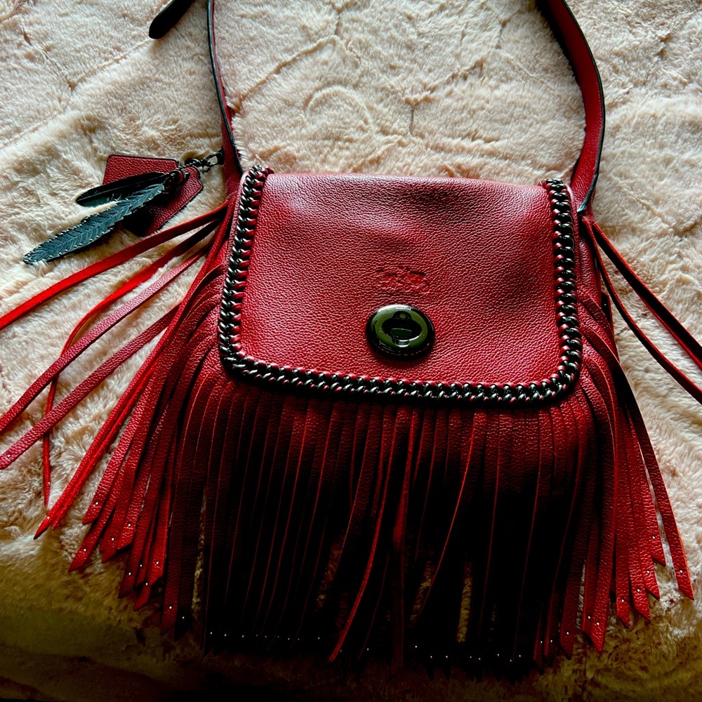 Read leather Coach fringed shoulder bag